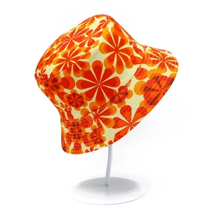 Unisex reversible bucket hat with vintage orange and yellow floral print in canvas