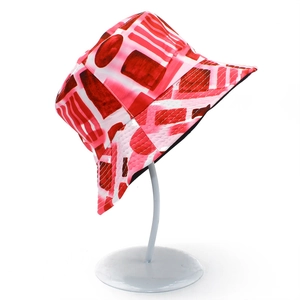 Detail of pink and white abstract pattern bucket hat with structured stitching on brim