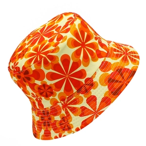 Close-up of vintage floral pattern bucket hat with warm orange and red floral embroidery