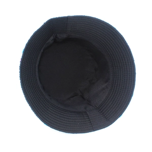 Top-down view of black bucket hat interior with reinforced concentric stitching details
