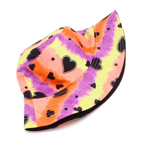 Detail of colorful tie-dye bucket hat with black heart pattern and sturdy cotton stitching