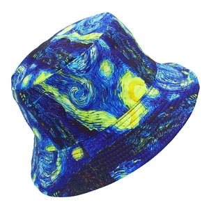 Reversible bucket hat featuring Van Gogh Starry Night oil painting print in blue and yellow