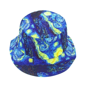 Close-up of Starry Night oil painting print on the crown of a reversible canvas bucket hat