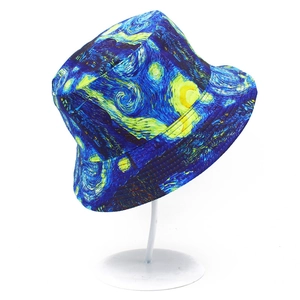 Detail shot of the Starry Night artistic print on a reversible twill cotton bucket hat