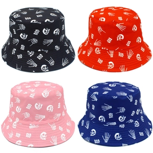 Detailed grid of four colorful skull bucket hats in black, red, pink, and blue