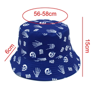 Detail view of navy blue bucket hat with skull prints and size measurements of 56-58cm