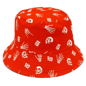 Detailed close-up of red festive bucket hat with white skull and BOO prints