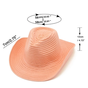 Detail of pink knitted cowboy hat with 7cm wide brim and 12cm crown height dimensions