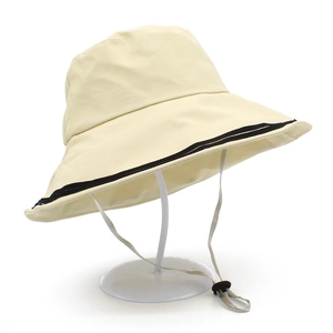 Women wide brim sun hat with black trim and adjustable chin strap in cream white