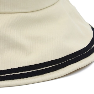 Beige wide-brim sun hat featuring navy blue double stripes and twill canvas texture