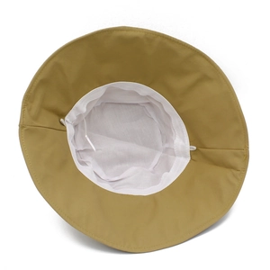 Detail view of the khaki sun hat featuring breathable white cotton lining and sweatband