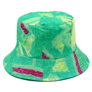 Detailed view of reversible bucket hat with colorful abstract watercolor dye patterns