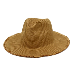 Classic tan raffia panama hat with fringe brim for summer sun protection outdoors