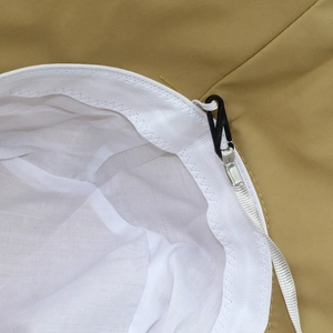 Close-up of khaki sun hat interior with detachable windproof rope and black hook