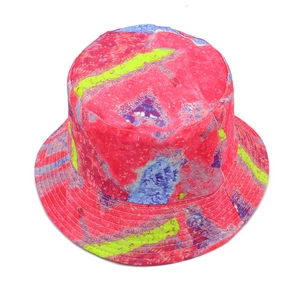 Detail view of colorful tie-dye bucket hat featuring neon stitching and reinforced brim