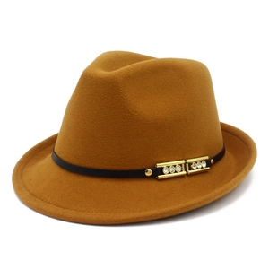 Detail of wool fedora hat with black leather band and rhinestone gold buckles