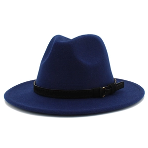 Detail of navy wool fedora hat featuring black leather band and gold metal buckle
