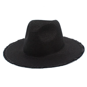 Classic black raffia fedora hat with frayed edges and spiral woven texture for summer