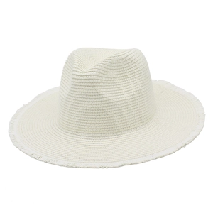 Close-up of white wide-brimmed raffia straw hat with unique frayed edge details