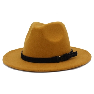 Detail view of ginger wool fedora hat with black leather belt and gold metal buckle