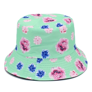 Floral bucket hat in mint green with pink and blue blossoms for summer sun protection
