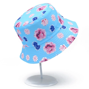 Floral reversible bucket hat in light blue with pink peony prints for summer sun protection