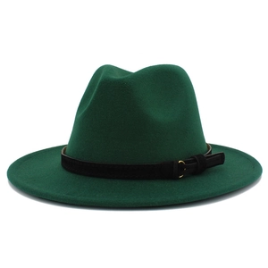 Detail of dark green wool felt fedora with a black decorative band and golden buckle