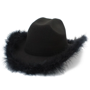 Western black felt cowboy hat with fluffy feather brim decoration on white background