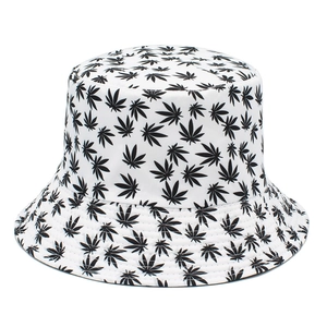 White canvas bucket hat with black maple leaf print for casual outdoor sun protection