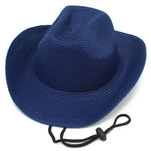 Detail of dark blue woven straw cowboy hat featuring adjustable black windproof chin strap