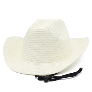 Close-up of white woven straw cowboy hat featuring adjustable black chin strap cord