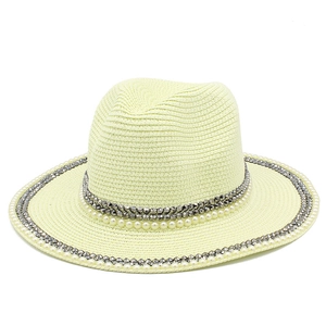 Panama straw sun hat with decorative pearl bands and wide brim for summer beach vacation