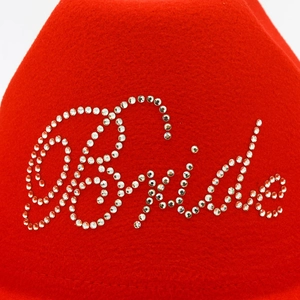 Red felt cowboy hat with sparkling crystal Bride lettering and white feather trim
