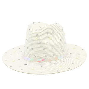 Detail of elegant straw hat featuring pearl, rhinestone, and iridescent sequin embellishments