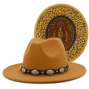 Detail of camel wool fedora with leopard print brim lining and metallic belt trim