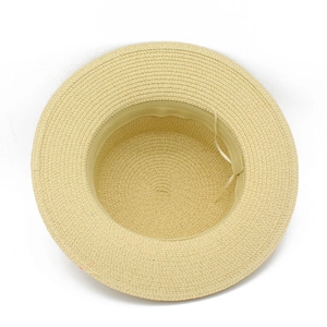 Detail view of woven straw hat interior featuring adjustable inner strap and sweatband
