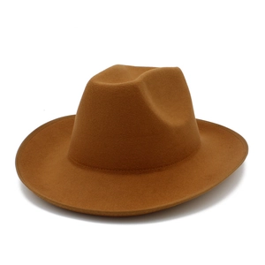 Close-up of camel brown wool fedora hat featuring a pinched crown and fine edge stitching