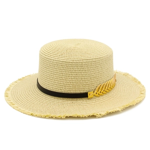 Classic straw boater hat with fringe brim and golden leaf accent for summer sun protection
