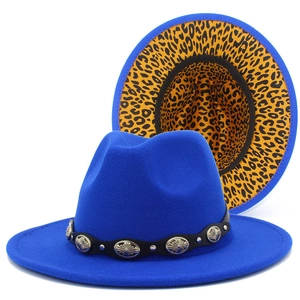 Detail of blue wool fedora featuring metallic studded leather band and leopard print lining