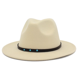 Detail of wide brim fedora hat with brown band and turquoise beads in cream felt