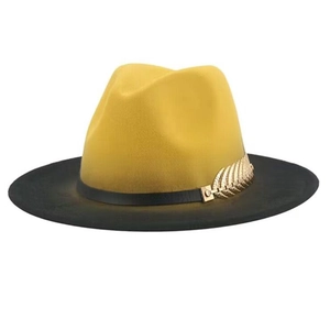 Fashionable two-tone yellow and black fedora hat with a golden feather metal accent