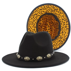 Detail of black fedora with leopard print lining and metallic rivet hatband decoration