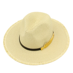 Straw beach jazz hat with fish bone accessory and raw fringe edges in beige color