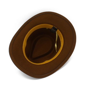 Detail view of brown fedora hat interior showing yellow sweatband and material label