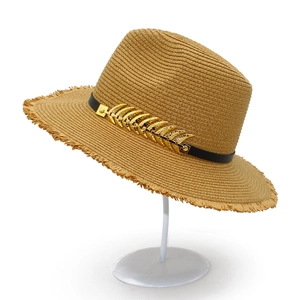 Straw beach jazz hat with fishbone metal accessory and frayed brim for outdoor sun protection