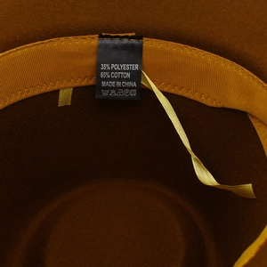 Detail of western wool hat interior with sweatband and cotton blend material label
