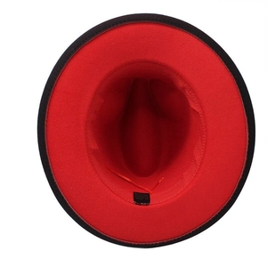 Detail view of the red interior and black brim on this two-tone gradient wool felt fedora