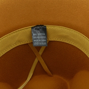 Detailed close-up showing the inner 65% cotton blend lining and care label of the hat