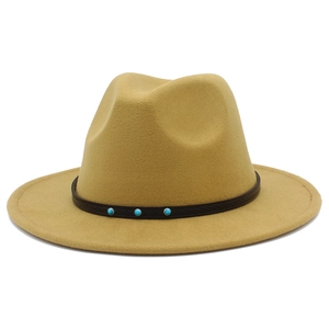 Detail of khaki wool fedora with brown leather band featuring turquoise stud accents