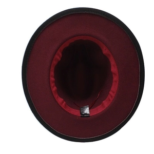 Detail of wool felt fedora interior showing red sweatband and 65% cotton fabric label